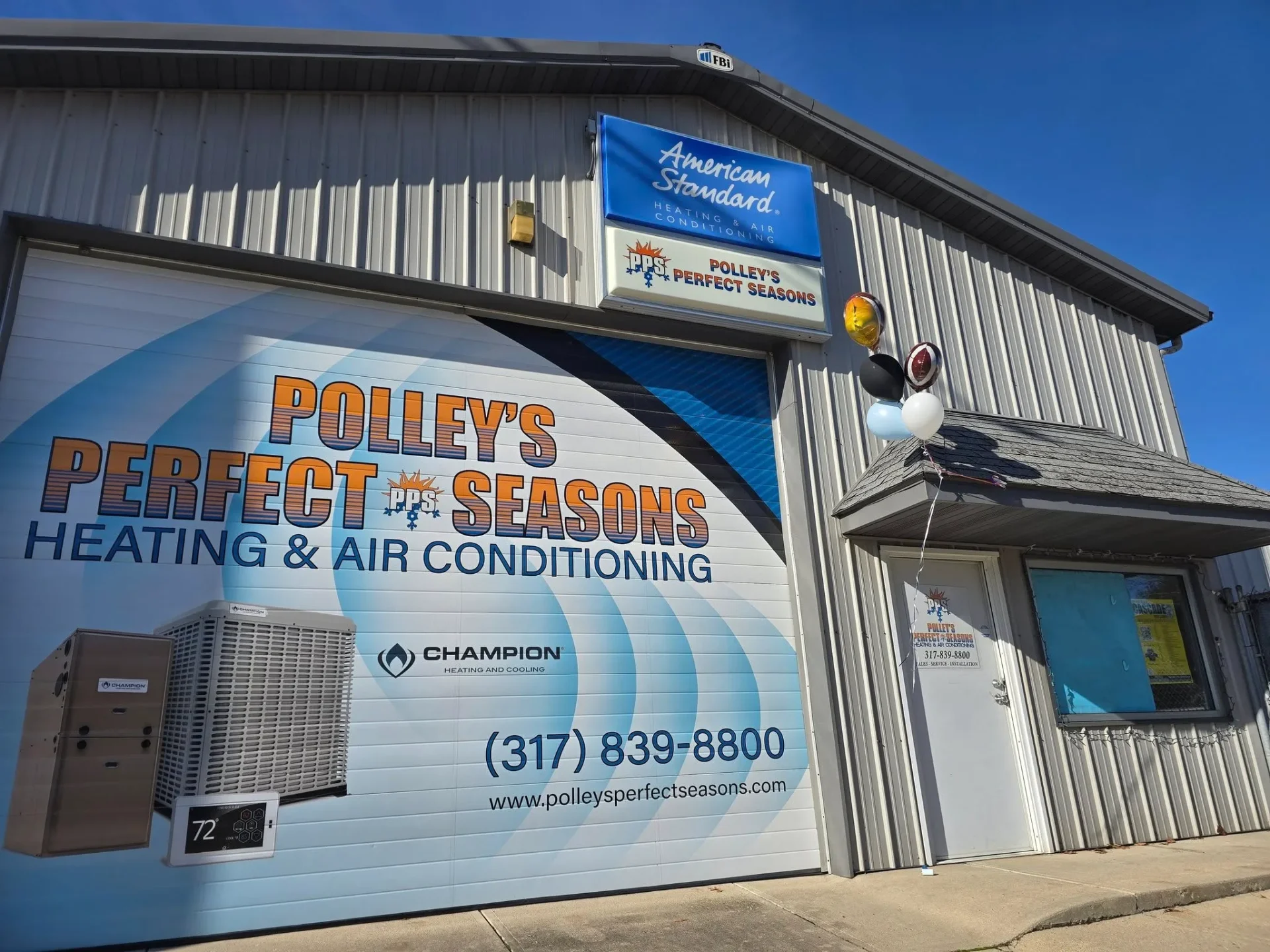 Polley's Perfect Seasons shop exterior with branded garage door
